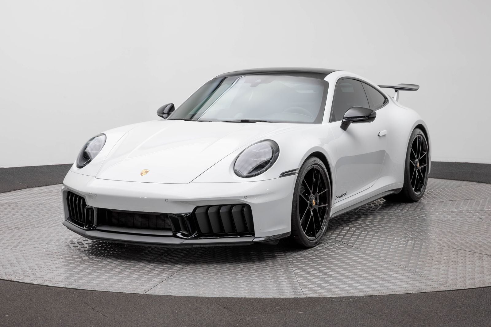 2025 Porsche 911 Carrera 4 GTS in White — front three-quarter view