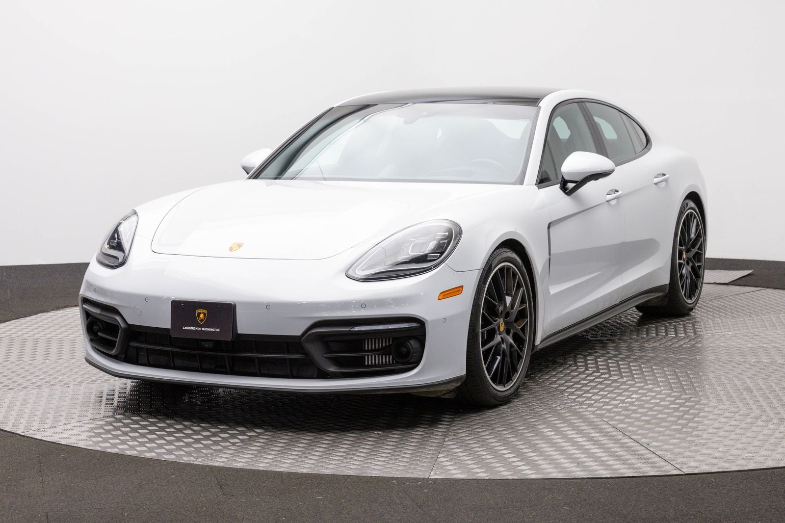2023 Porsche Panamera 4 in White — front three-quarter view